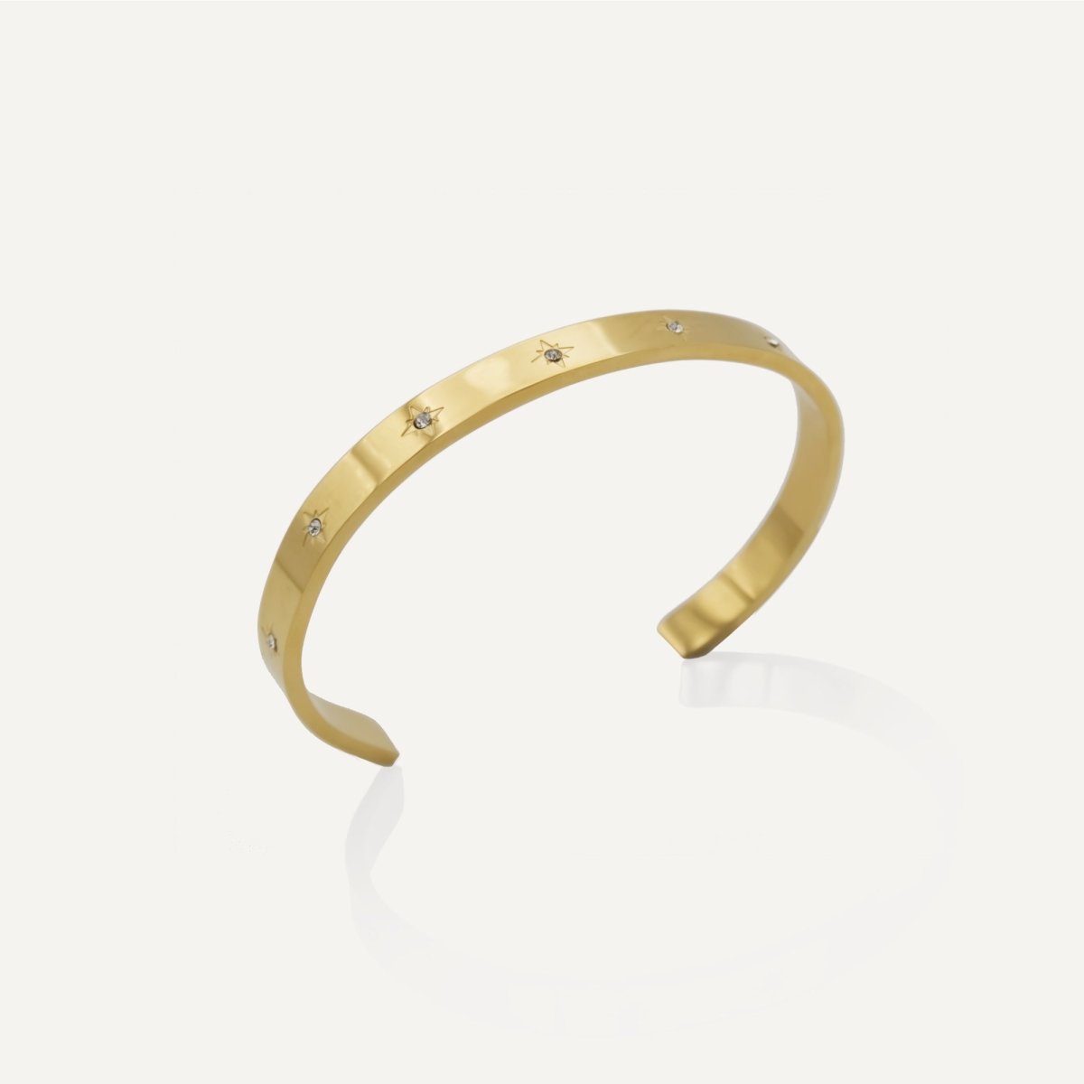 Rush gold cuff trendy popular chic bracelet with stones men women Unisex silver star-engraved cuff bracelet from Rush with a sleek open design and subtle polished surface, perfect for versatile styling.