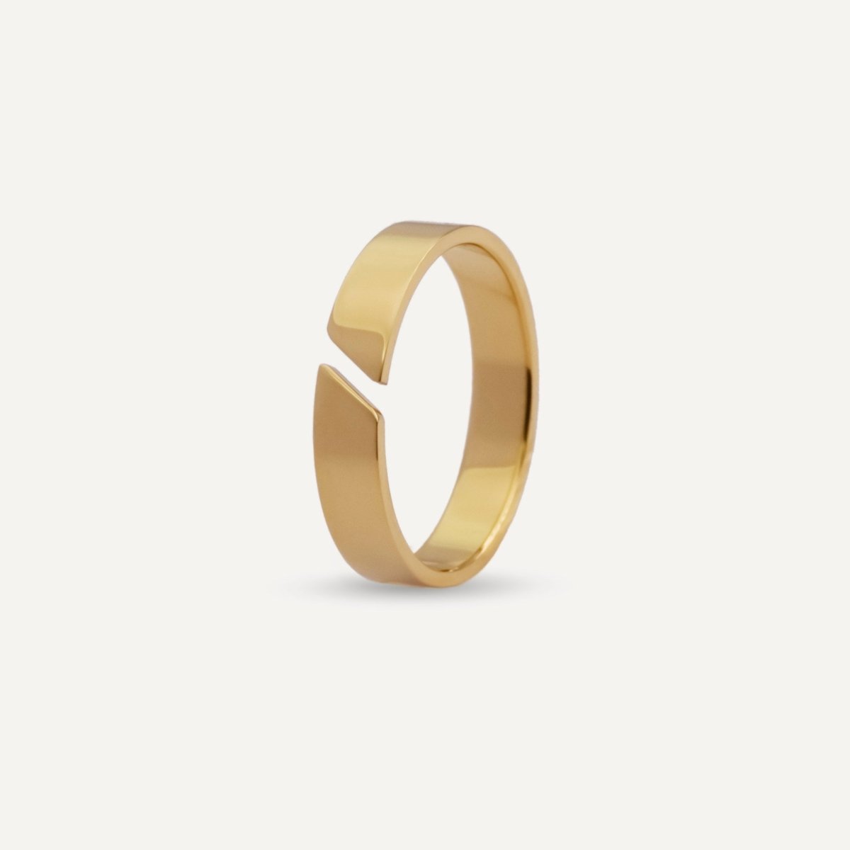 Unisex gold open band ring from Rush with a minimalist cut-out detail and polished finish, designed for versatile everyday wear popular trendy sleek ring