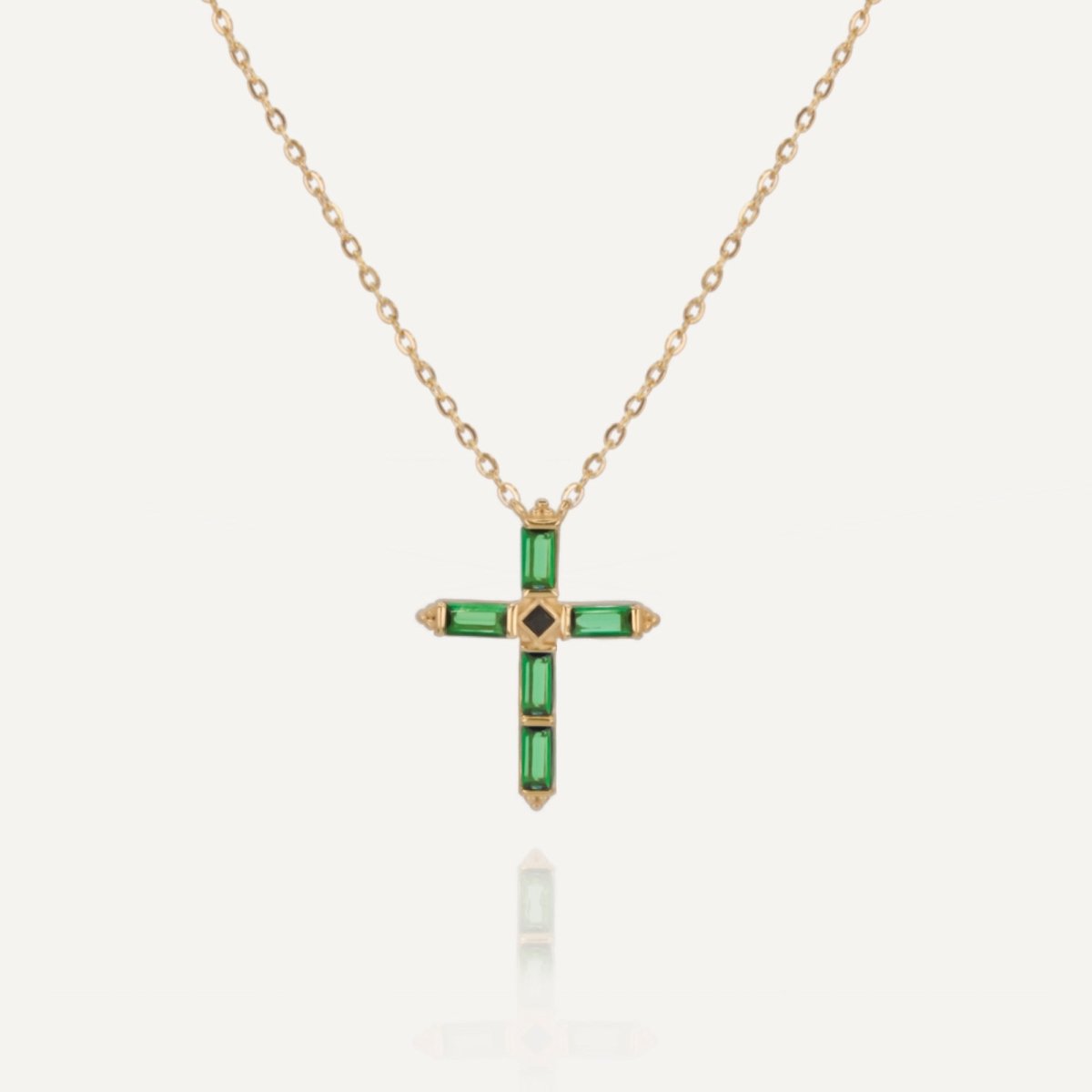 Rush gold green emerald stones men women chic party popular trendy cross necklace Unisex silver cross pendant necklace from Rush featuring baguette-cut green stones in a modern polished setting, designed for statement wear.
