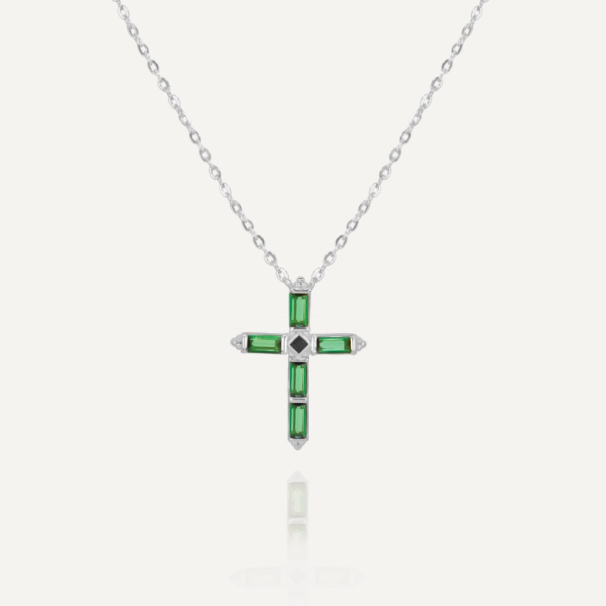 Rush silver green emerald stones men women chic party popular trendy cross necklace Unisex silver cross pendant necklace from Rush featuring baguette-cut green stones in a modern polished setting, designed for statement wear.