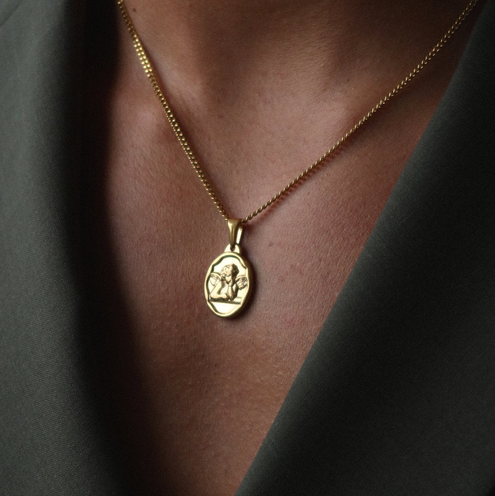 men women gold necklace with cherub medallion pendant from Rush, designed with engraved detailing and a refined polished finish for versatile wear. trendy popular angel necklace 