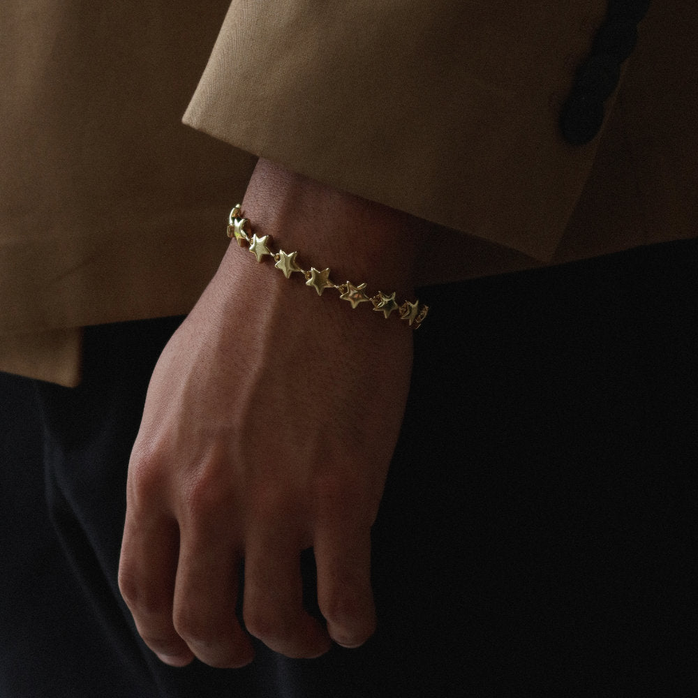 Rush gold star pattern shiny heavy weight trendy popular men women bracelet Unisex silver star bracelet from Rush with interlinked star charms and adjustable clasp, offering a playful yet minimalist statement look