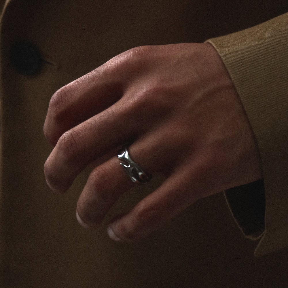 Unisex silver open ring from Rush with an abstract fluid shape, polished finish, and bold sculptural design for statement styling men women popular trendy sleek irregular shaped ring 