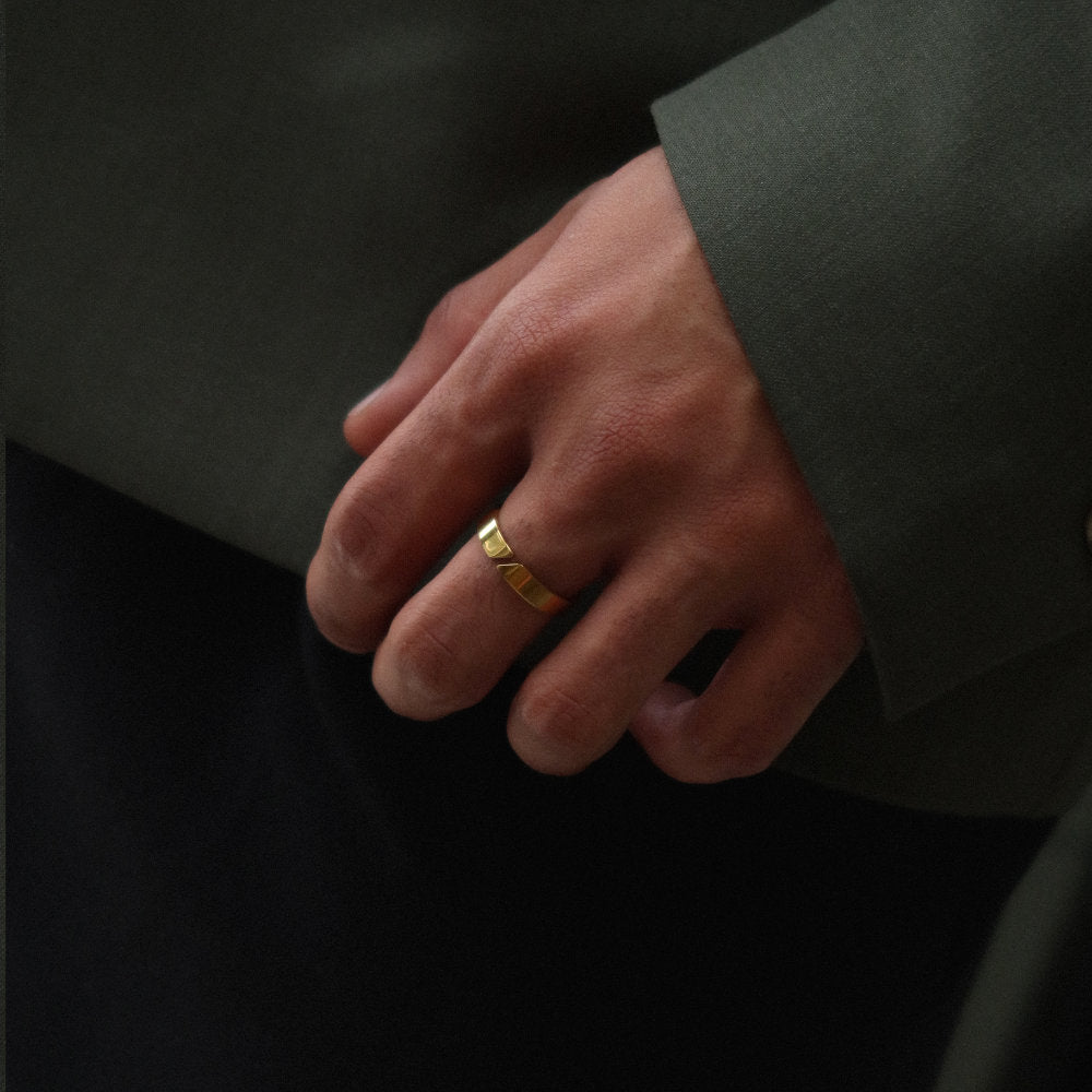 Unisex gold open band ring from Rush with a minimalist cut-out detail and polished finish, designed for versatile everyday wear popular trendy sleek ring