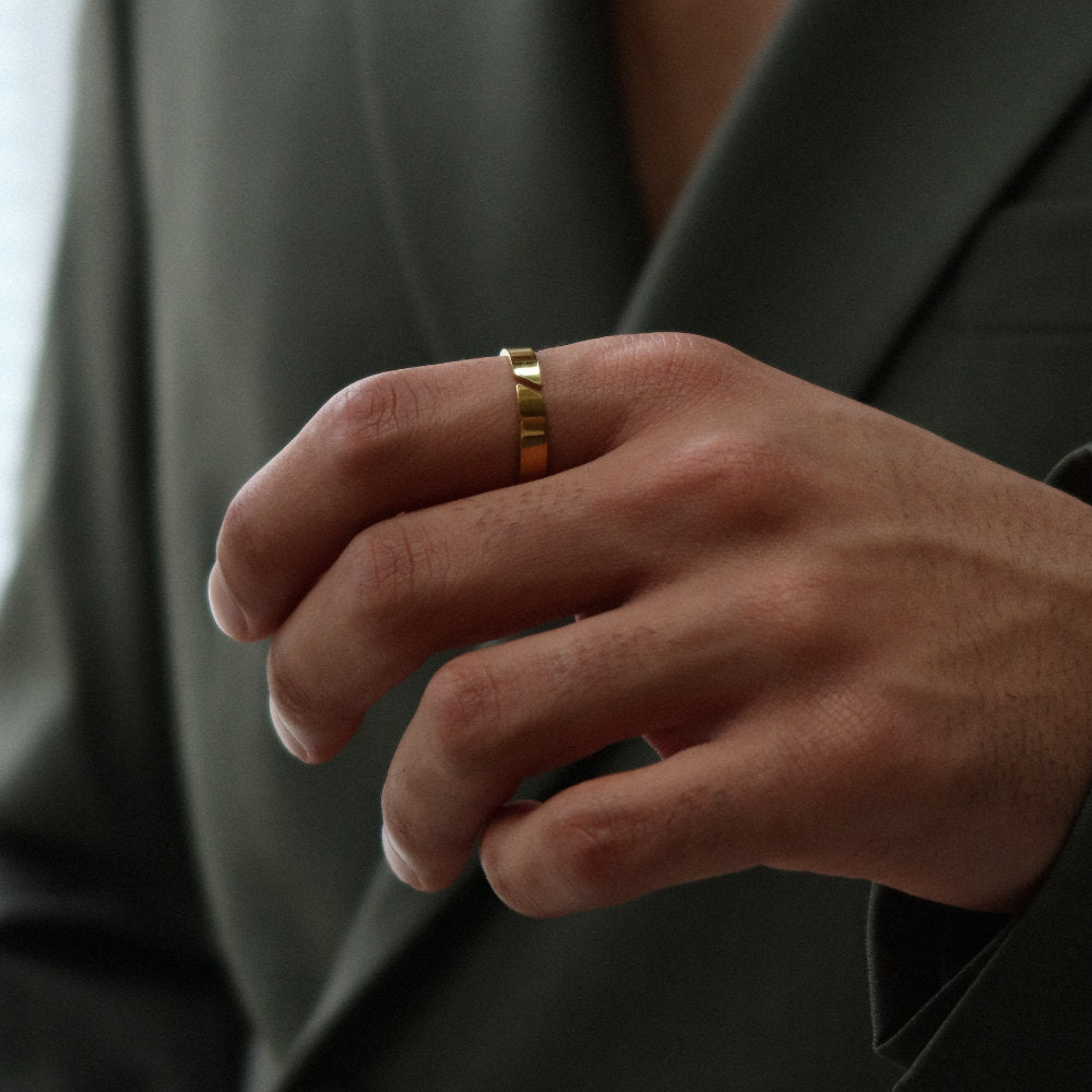 Unisex gold open band ring from Rush with a minimalist cut-out detail and polished finish, designed for versatile everyday wear popular trendy sleek ring