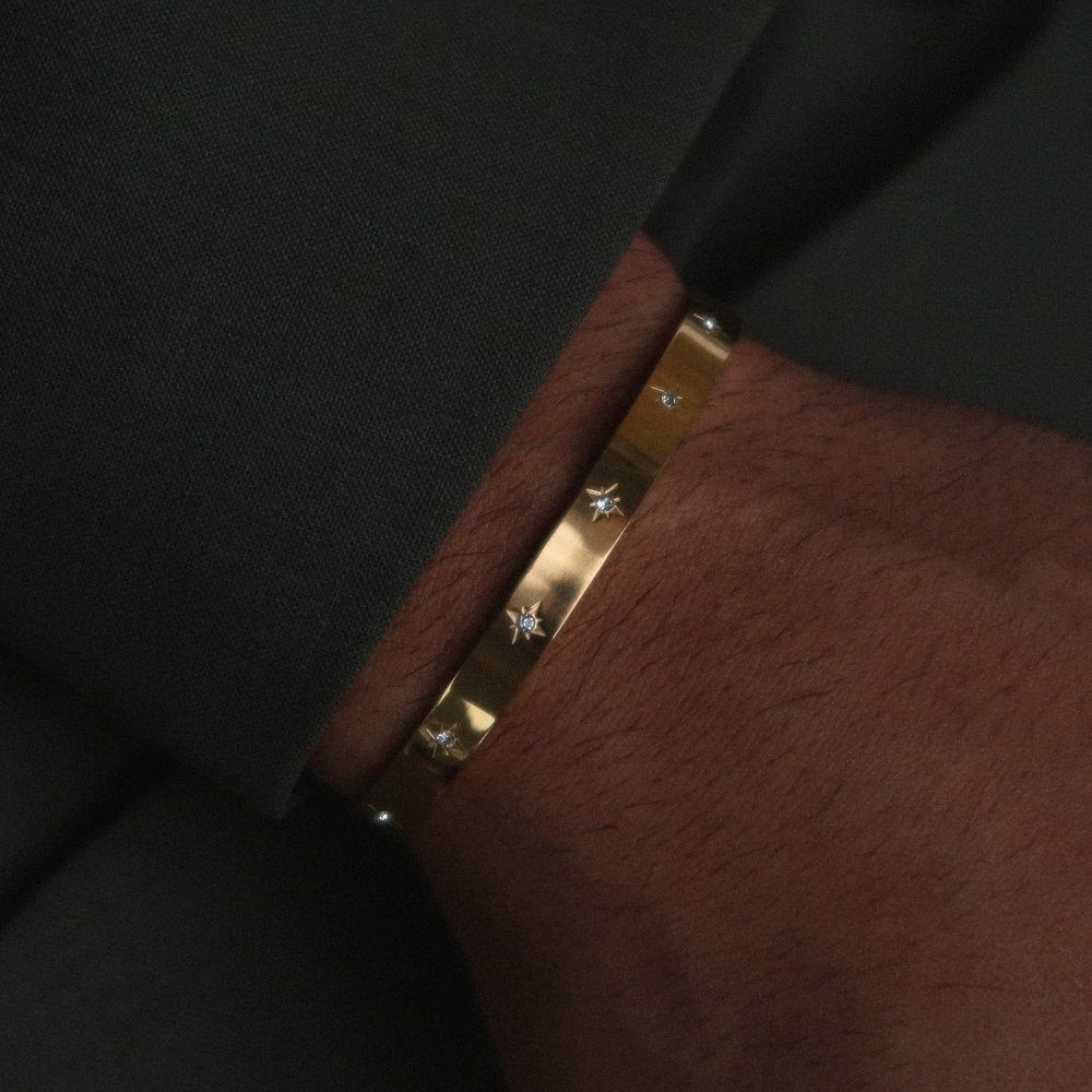 Rush gold cuff trendy popular chic bracelet with stones men women Unisex silver star-engraved cuff bracelet from Rush with a sleek open design and subtle polished surface, perfect for versatile styling.