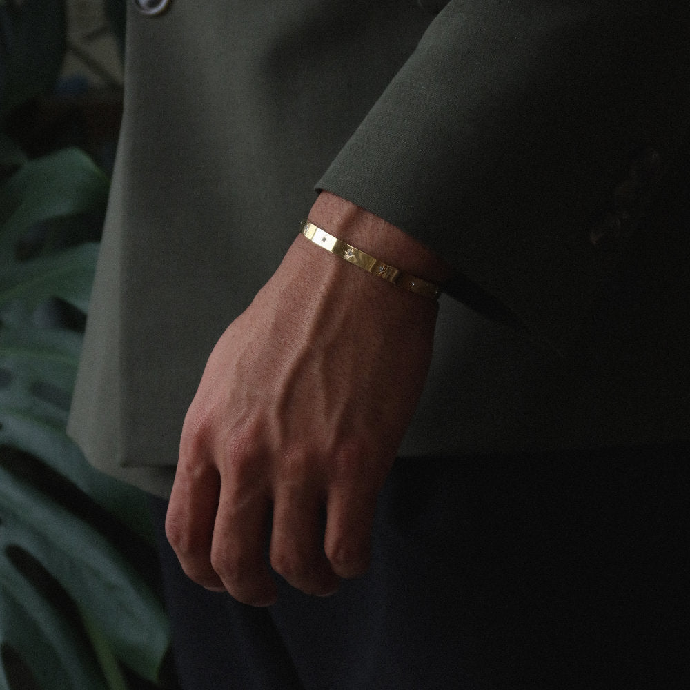 Rush gold cuff trendy popular chic bracelet with stones men women Unisex silver star-engraved cuff bracelet from Rush with a sleek open design and subtle polished surface, perfect for versatile styling.