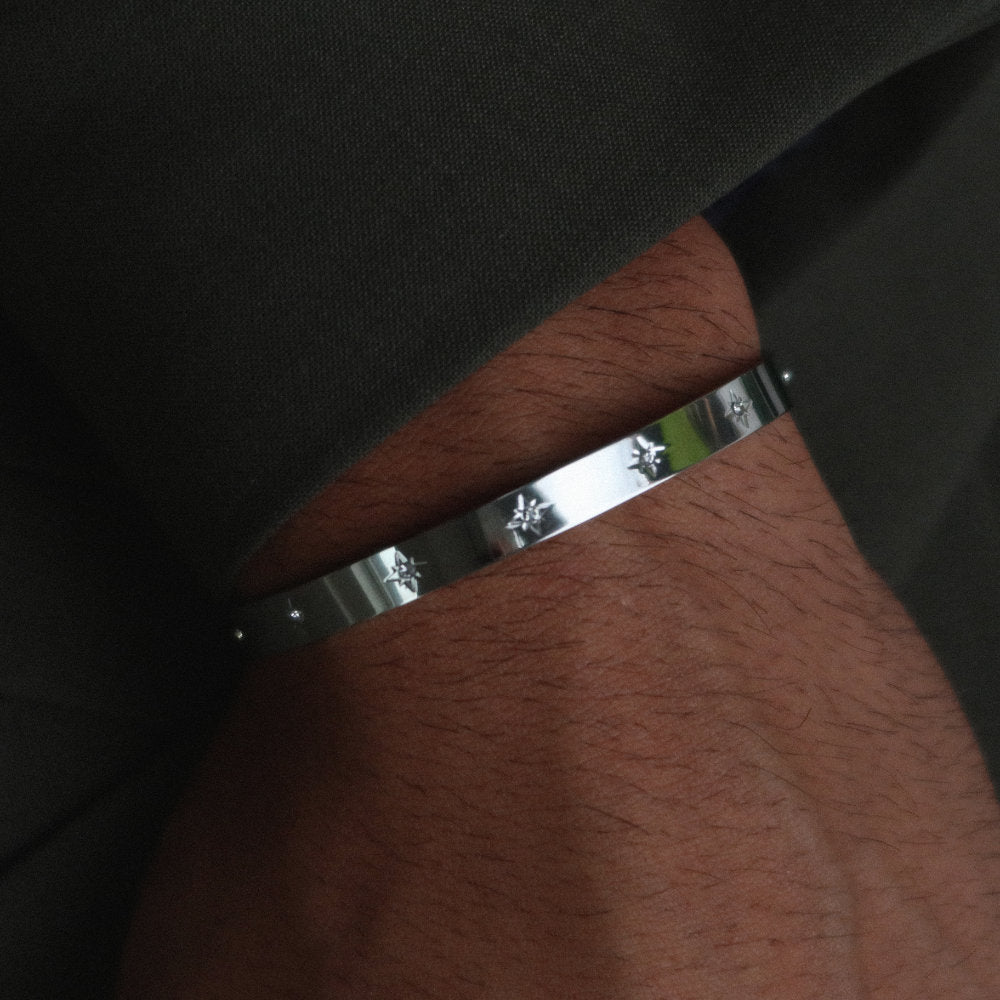 Rush silver cuff trendy popular chic bracelet with stones men women Unisex silver star-engraved cuff bracelet from Rush with a sleek open design and subtle polished surface, perfect for versatile styling.