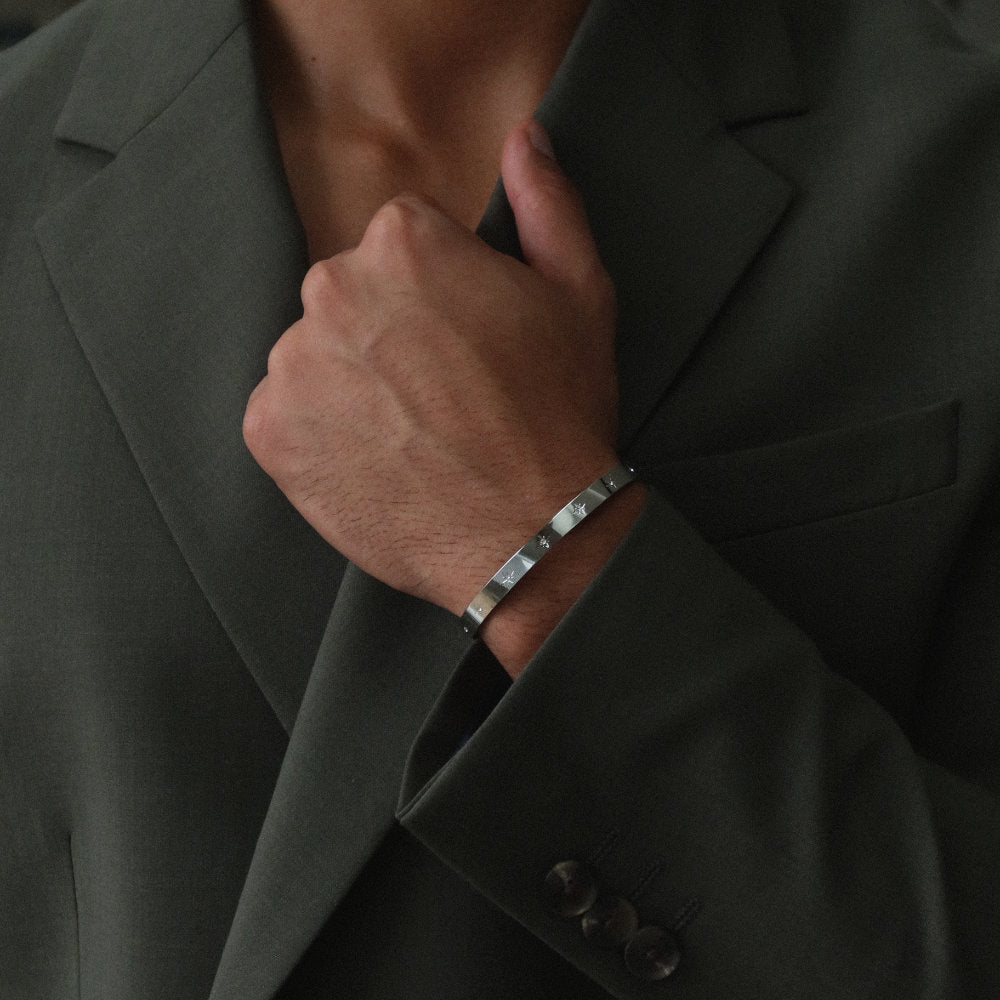 Rush silver cuff trendy popular chic bracelet with stones men women Unisex silver star-engraved cuff bracelet from Rush with a sleek open design and subtle polished surface, perfect for versatile styling.