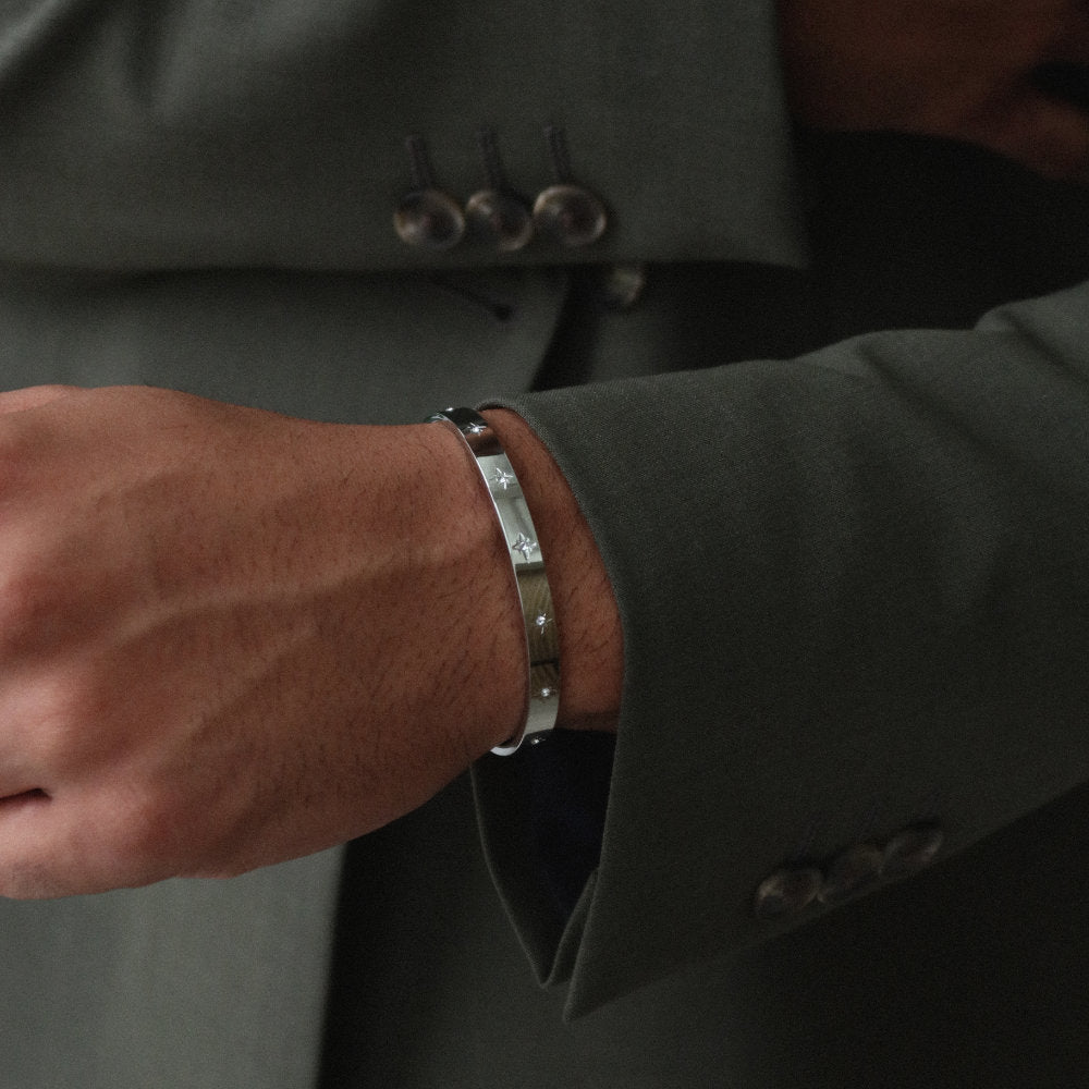 Rush silver cuff trendy popular chic bracelet with stones men women Unisex silver star-engraved cuff bracelet from Rush with a sleek open design and subtle polished surface, perfect for versatile styling.