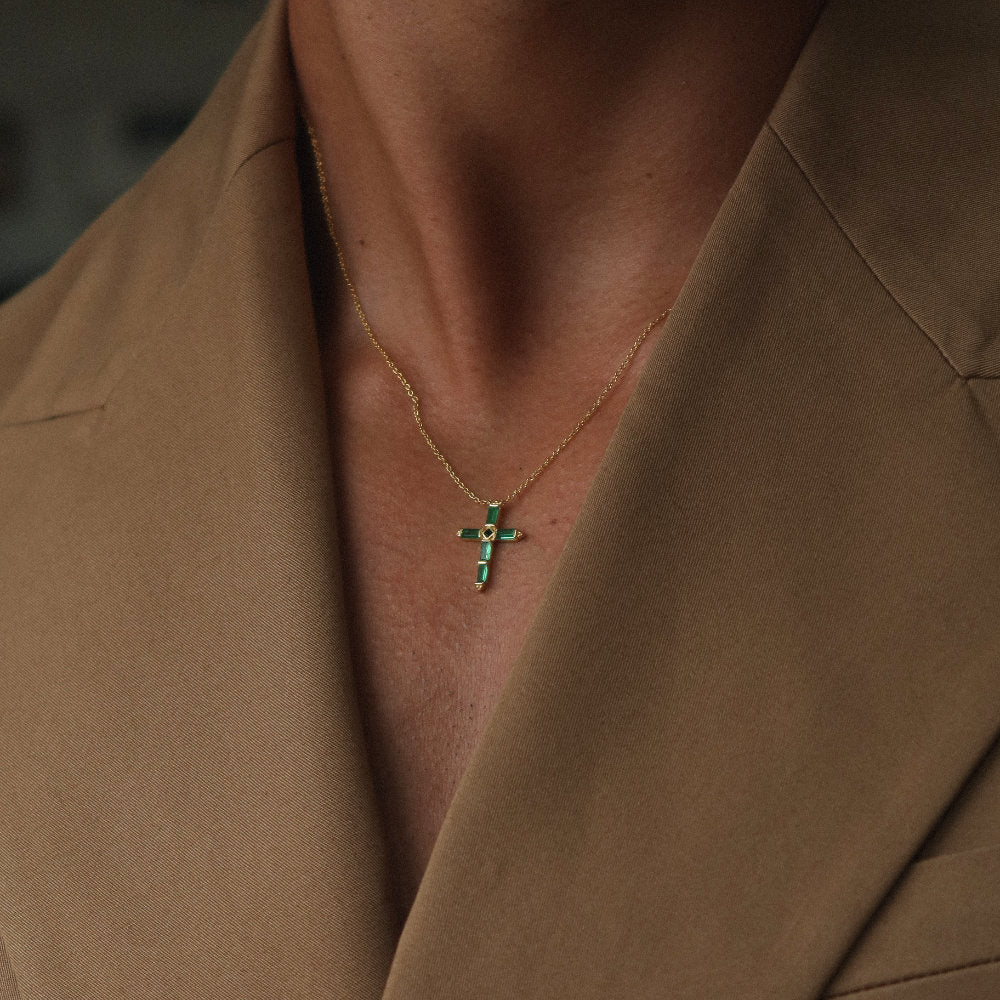 Rush gold green emerald stones men women chic party popular trendy cross necklace Unisex silver cross pendant necklace from Rush featuring baguette-cut green stones in a modern polished setting, designed for statement wear.