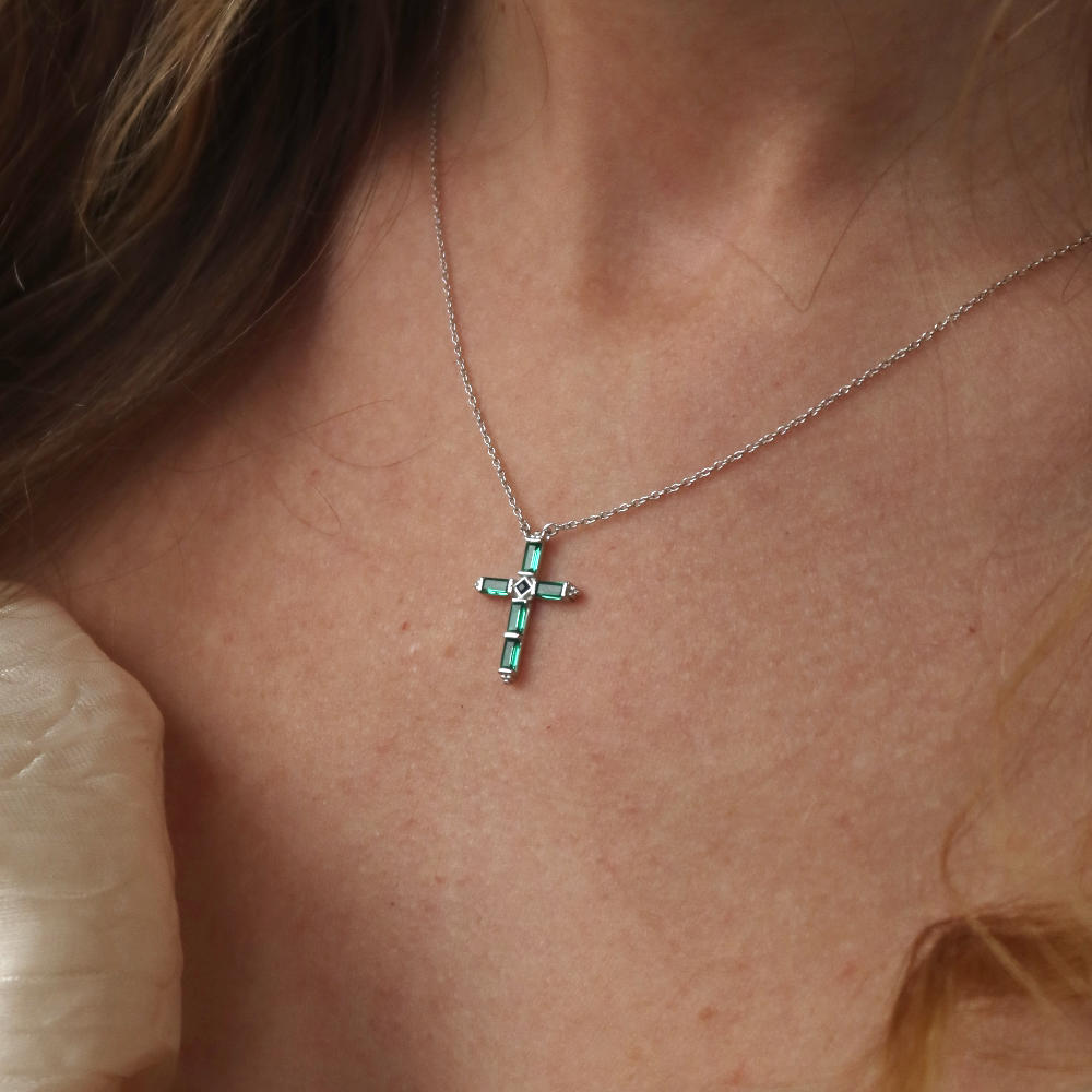 Rush silver green emerald stones men women chic party popular trendy cross necklace Unisex silver cross pendant necklace from Rush featuring baguette-cut green stones in a modern polished setting, designed for statement wear.