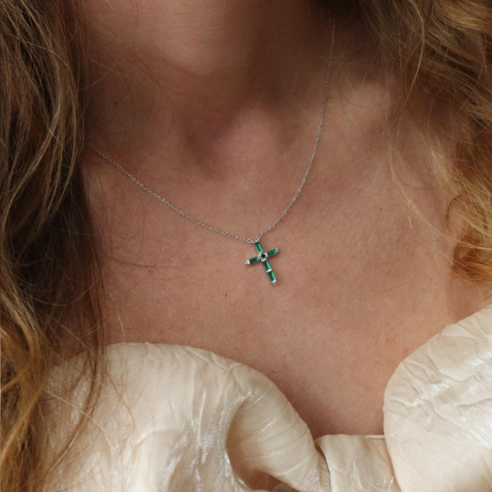 Rush silver green emerald stones men women chic party popular trendy cross necklace Unisex silver cross pendant necklace from Rush featuring baguette-cut green stones in a modern polished setting, designed for statement wear.