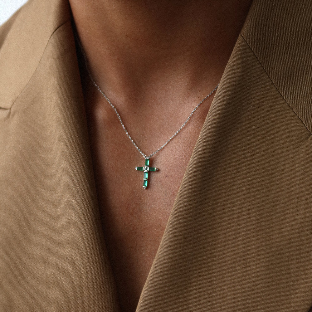 Rush silver green emerald stones men women chic party popular trendy cross necklace Unisex silver cross pendant necklace from Rush featuring baguette-cut green stones in a modern polished setting, designed for statement wear.