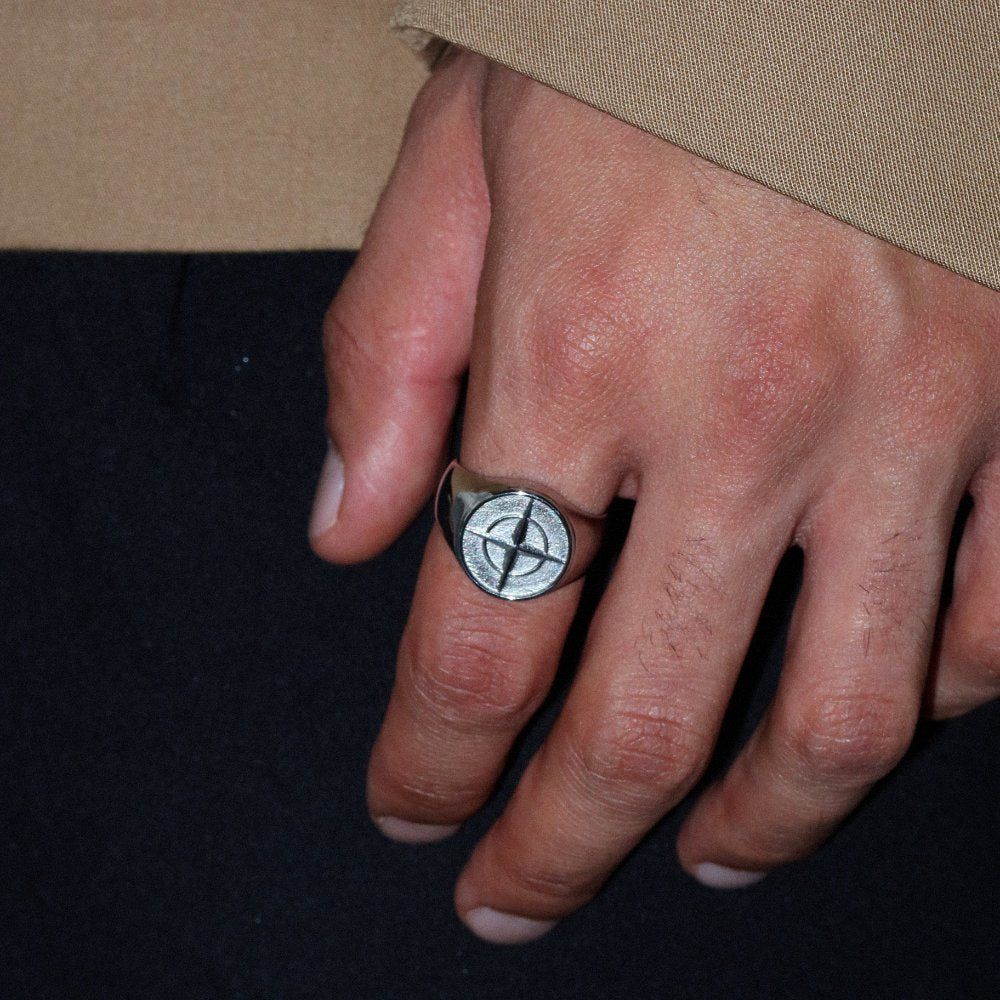 Unisex silver compass signet ring from Rush with an engraved compass design, polished finish, and bold modern style for everyday or statement wear. men women trendy popular sleek ring 