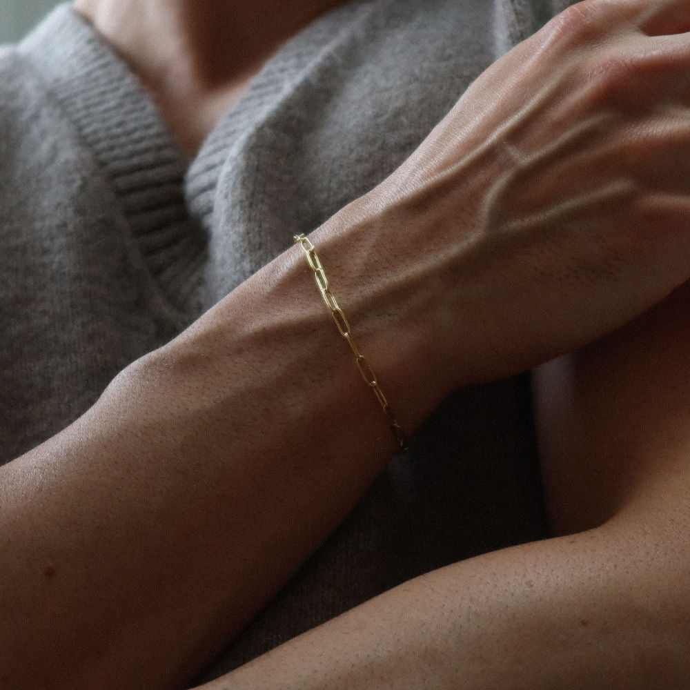 Rush paper clip chain gold men women popular trendy sleek bracelet Unisex silver elongated link bracelet from Rush featuring a sleek paperclip chain design, perfect for layering or solo statement styling.