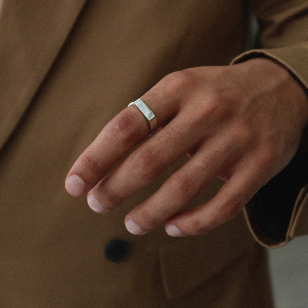 Minimalist unisex silver rectangular signet ring from Rush, designed with clean lines and a polished finish, perfect for everyday wear or statement styling. men women popular trendy sleek ring