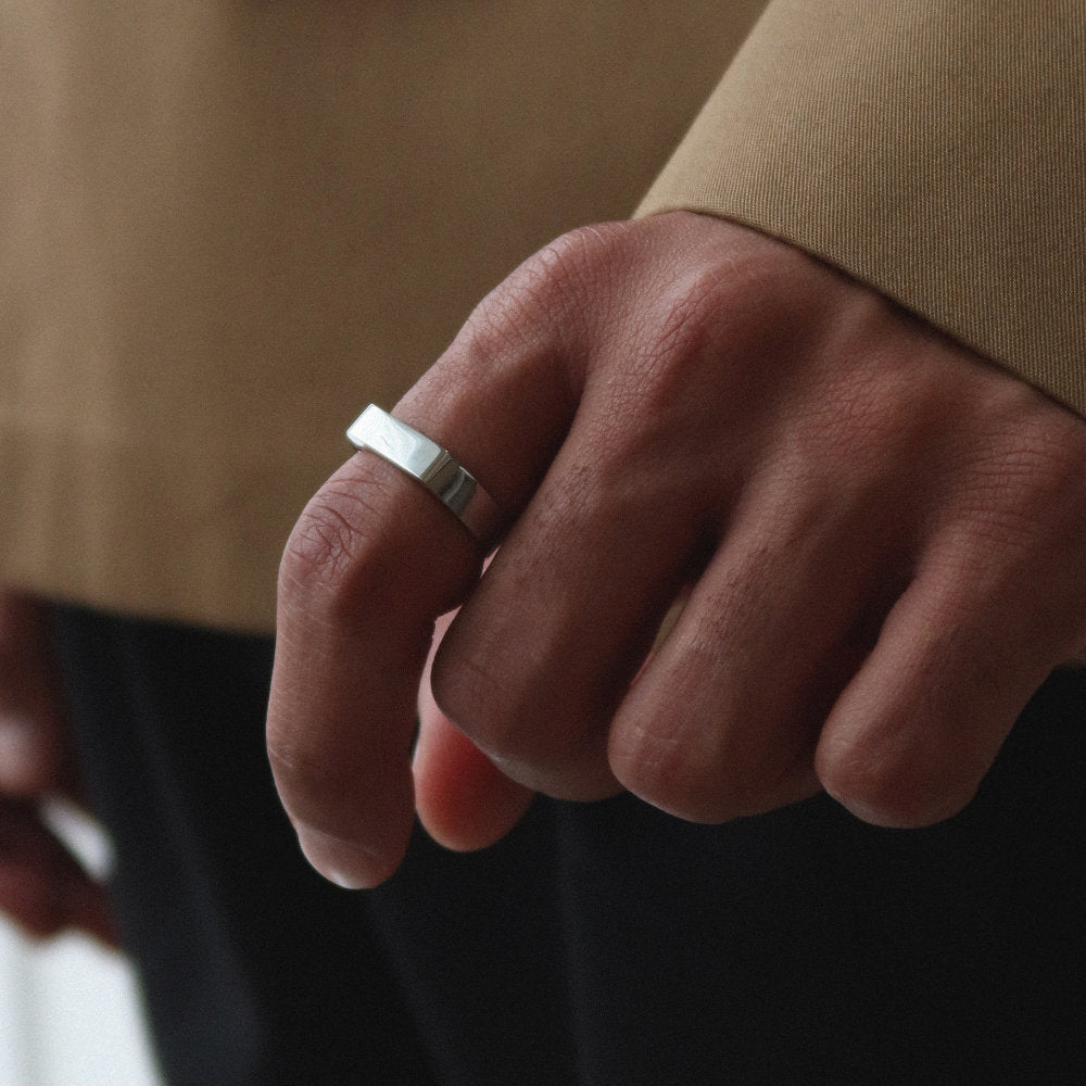Minimalist unisex silver rectangular signet ring from Rush, designed with clean lines and a polished finish, perfect for everyday wear or statement styling. men women popular trendy sleek ring