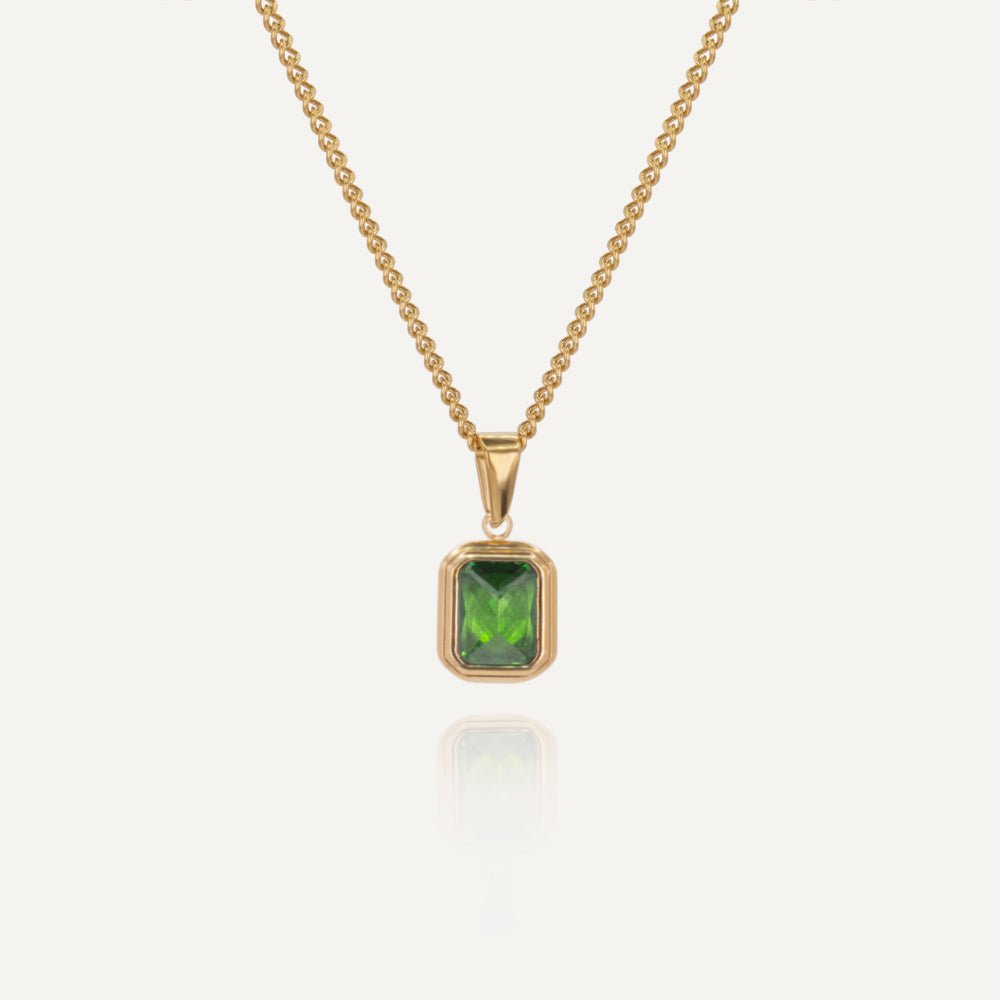 Rush green emerald stone pendant men women trendy popular chic necklace 
Unisex gold-plated chain necklace with emerald-green pendant