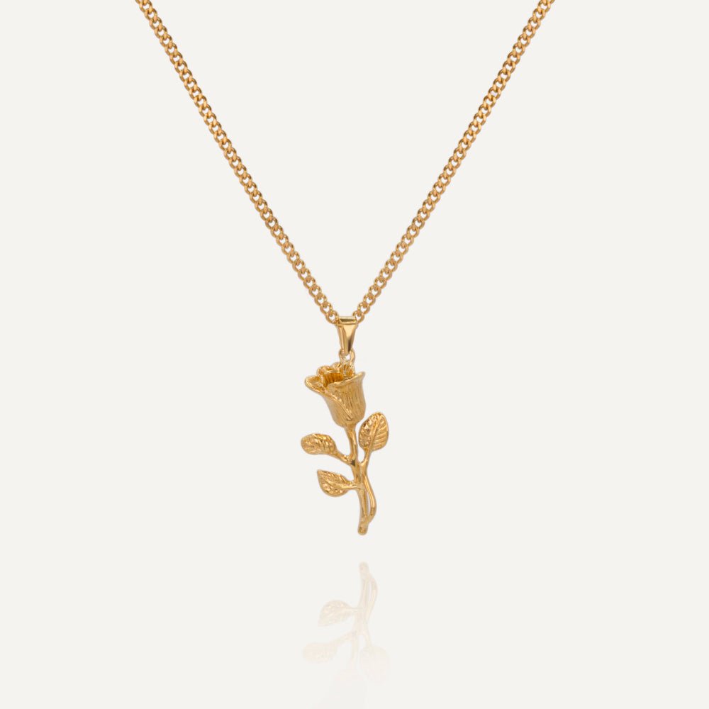 Unisex gold necklace with rose flower pendant from Rush, showcasing a delicate floral design for versatile everyday or evening wear. men women floral trendy popular necklace 
