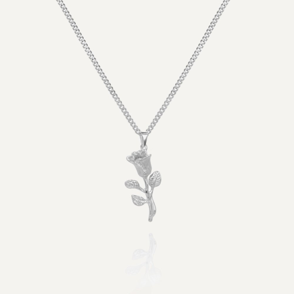 Unisex silver necklace with rose flower pendant from Rush, showcasing a delicate floral design for versatile everyday or evening wear. men women floral trendy popular necklace 
